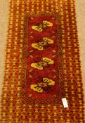 Persian design pink ground rug decorated with Guls,