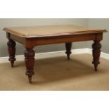 Victorian mahogany rectangular dining table on carved and fluted supports, ceramic castors,