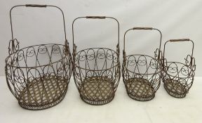 Set of four graduating wire work baskets,
