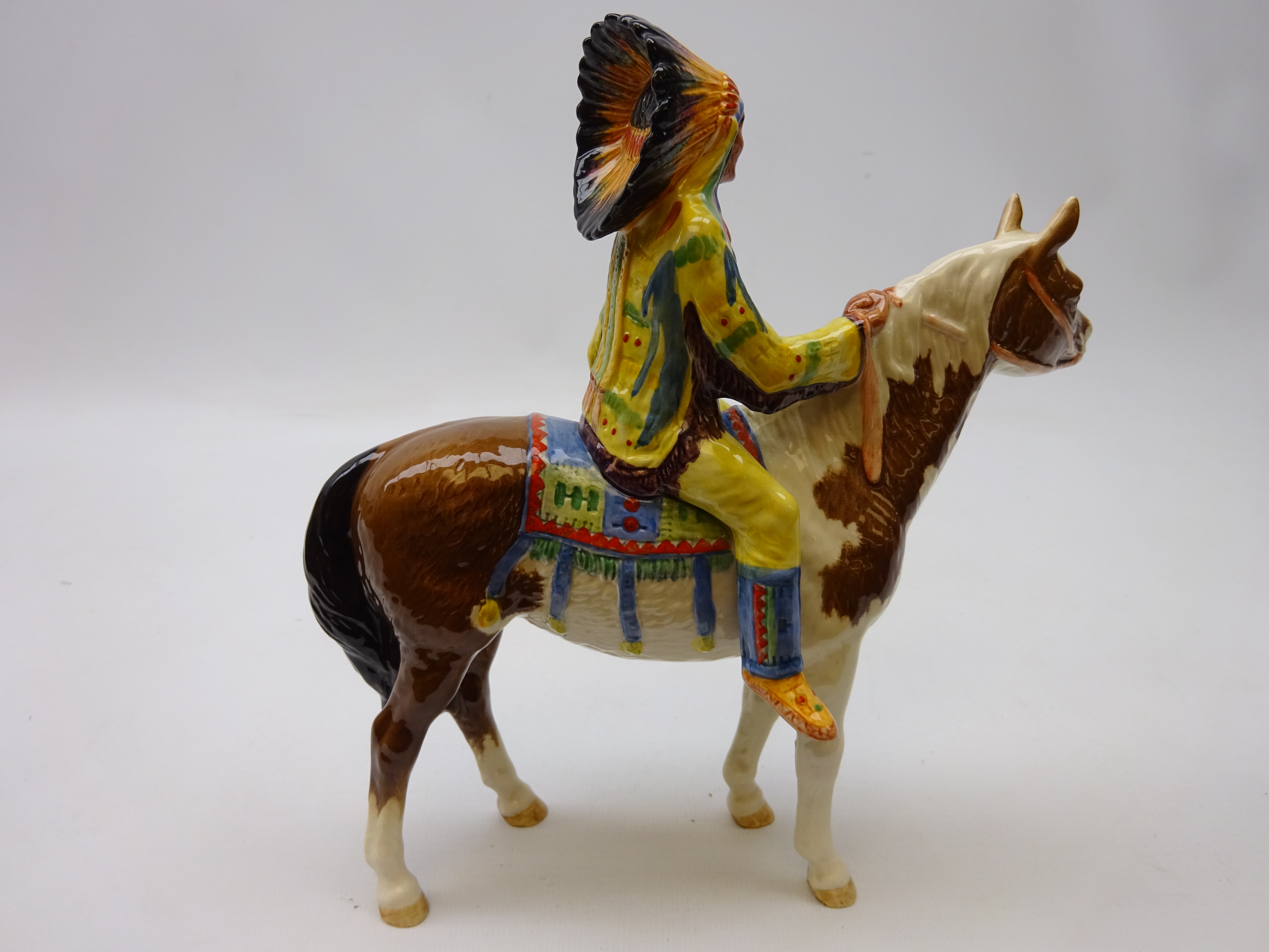 Beswick North American Indian Chief, on Skewbald pony, in full headdress, printed mark, model no. - Image 2 of 2