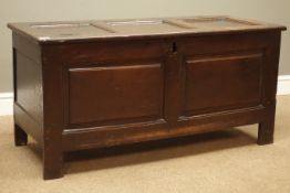 Early 18th century oak coffer, rectangular hinged lid above fielded panelled front, stile supports,
