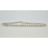 18ct white gold diamond bracelet, line design stamped 750 approx 1.