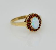 Gold opal and garnet cluster ring hallmarked 9ct Condition Report size L-M 2.
