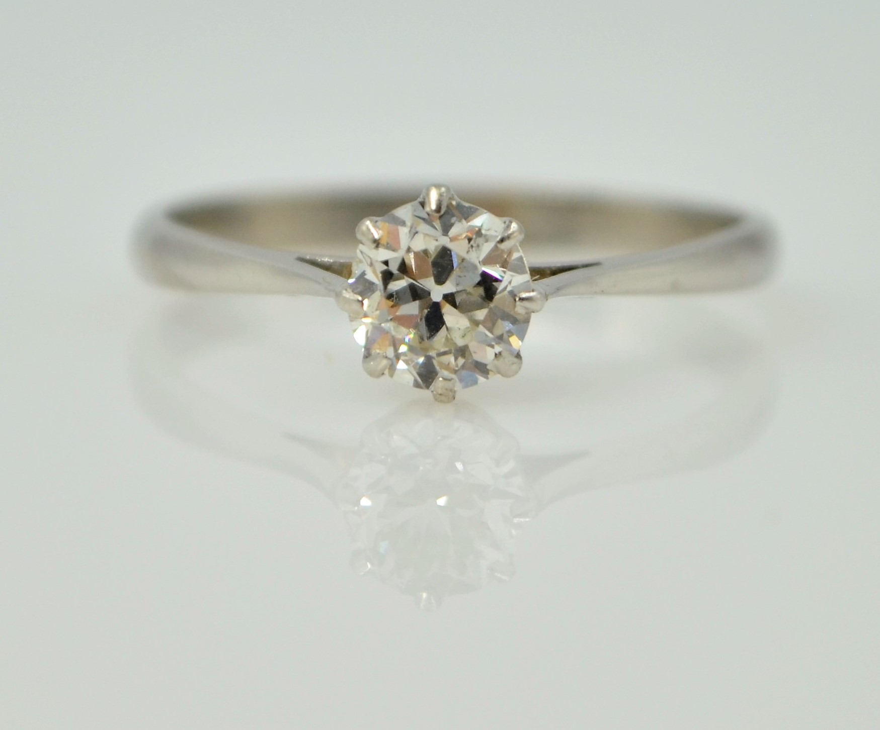 Platinum set solitaire diamond ring of approx 0.