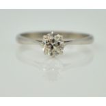 Platinum set solitaire diamond ring of approx 0.