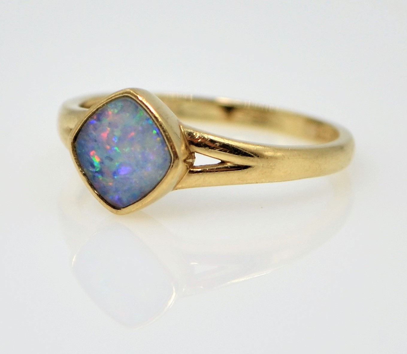 Gold opal square rim set ring hallmarked 9ct Condition Report size S 2.