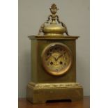 Early 20th century gilt metal and brass mantel clock, concave Arabic dial with pierced floral mount,