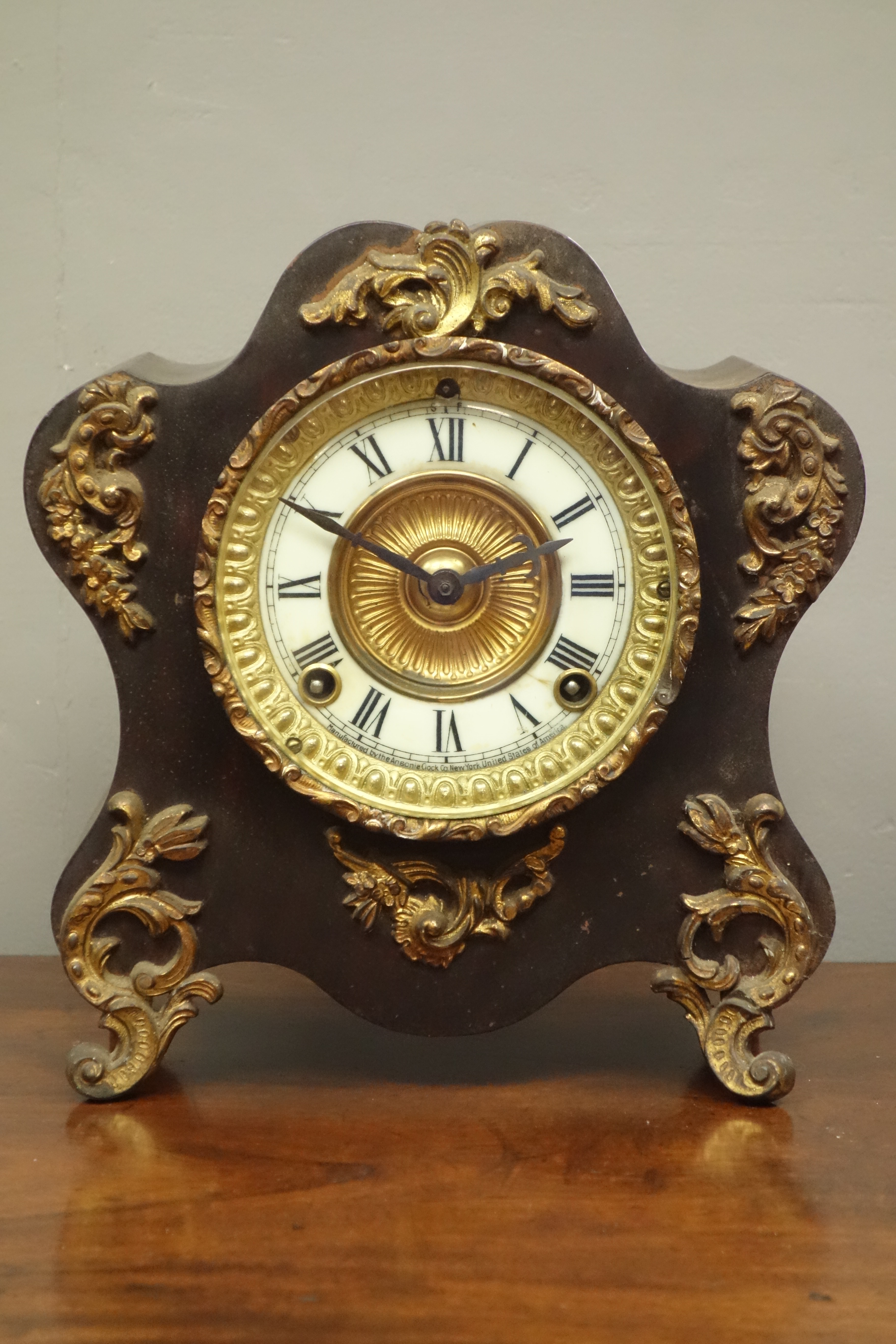 Late19th century ornate cartouche shaped mantel clock by 'Ansonia Clock Co.