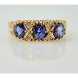 18ct gold tanzanite & diamond ring hallmarked Condition Report size N 4.