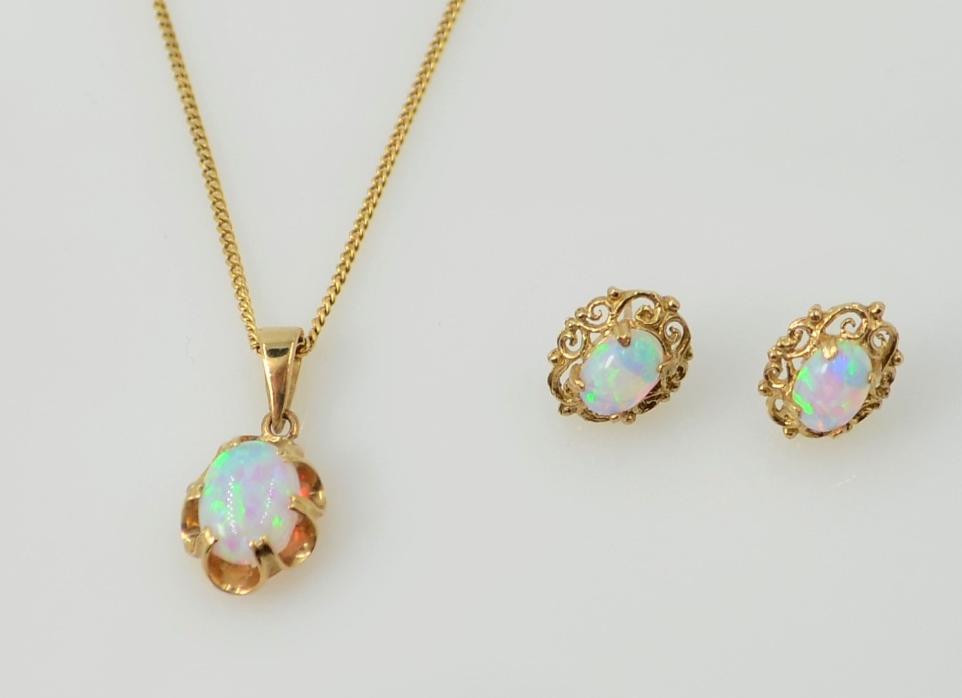 9ct gold opal pendant necklace hallmarked 9ct and a similar pair stud ear-rings