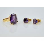 Large amethyst gold ring stamped 585 14K and pair matching ear-rings Condition Report