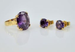 Large amethyst gold ring stamped 585 14K and pair matching ear-rings Condition Report