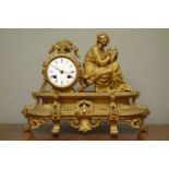 Late 19th/early 20th century gilt metal figural mantel clock, with maiden playing the harp,