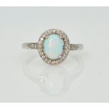 Silver opal halo dress ring stamped 925 Condition Report size M<a href='//www.