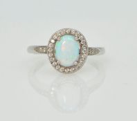 Silver opal halo dress ring stamped 925 Condition Report size M<a href='//www.