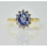 Ceylon sapphire and diamond gold cluster ring, hallmarked 18ct sapphire approx 1.