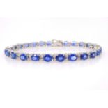 18ct white gold diamond and sapphire bracelet stamped 750, diamonds approx 0.