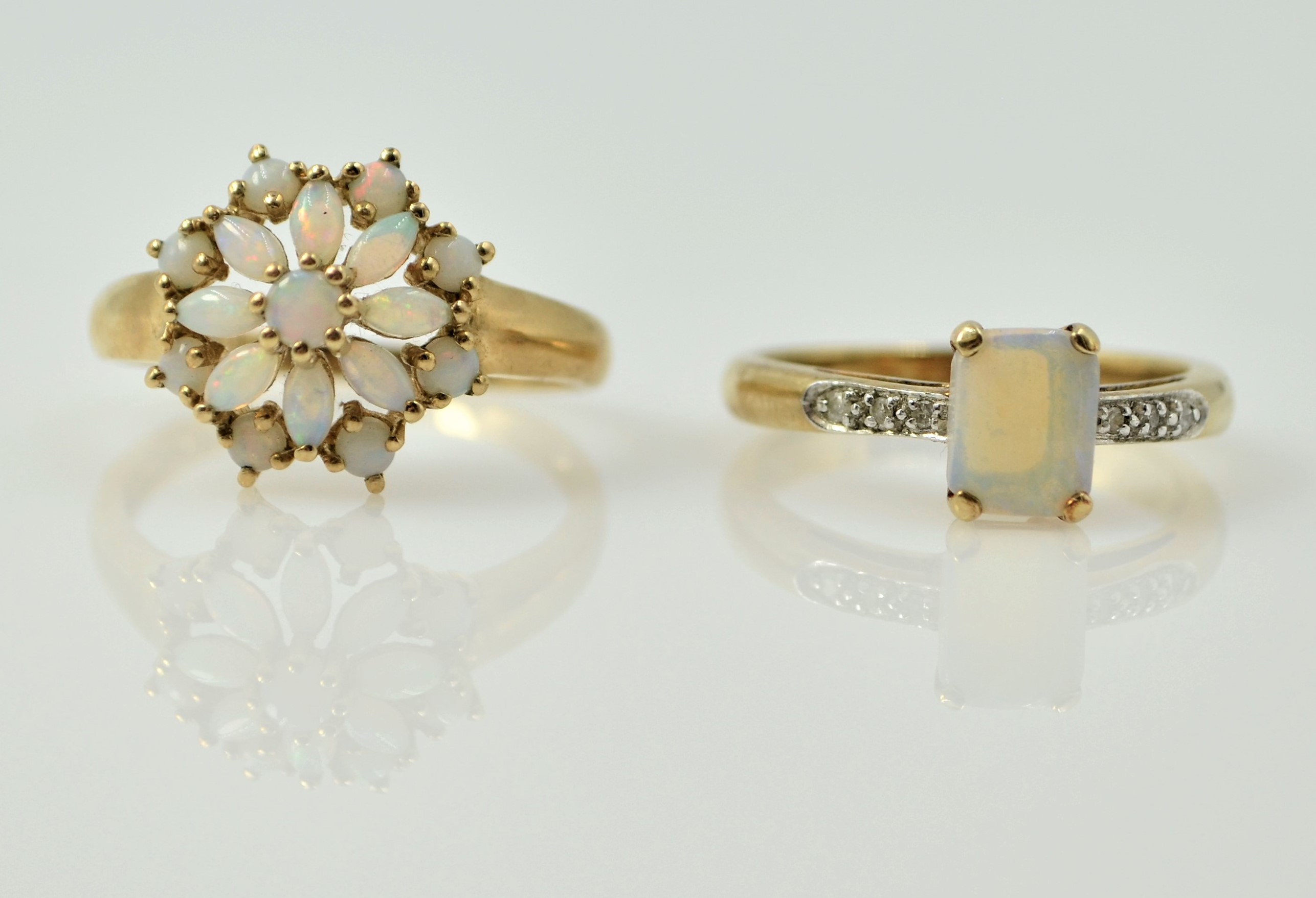 Opal cluster gold ring and an opal and diamond ring both hallmarked 9ct Condition Report