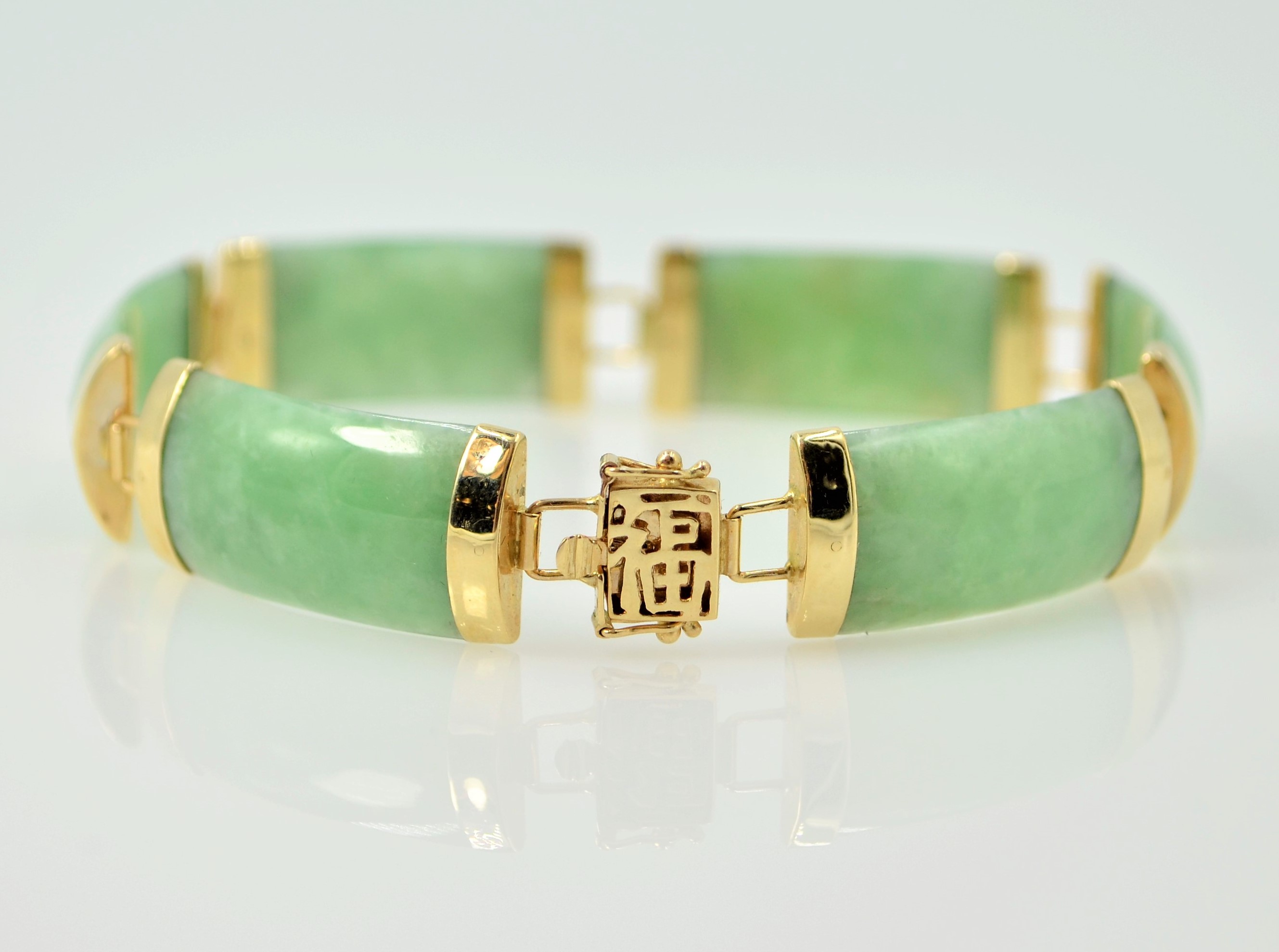 Gold mounted jade bracelet stamped 14K585 Condition Report <a href='//www.