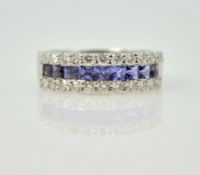 Tanzanite and diamond half eternity ring,