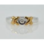 9ct white gold ring set with single diamond with yellow gold criss-cross detail hallmarked