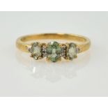 Peridot and diamond gold ring hallmarked 9ct Condition Report 2.