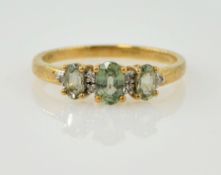 Peridot and diamond gold ring hallmarked 9ct Condition Report 2.
