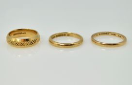Three 9ct gold wedding bands, approx 8.2gm Condition Report <a href='//www.