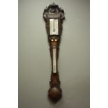 Victorian Black Forest style carved oak stick barometer,register inscribed J.Somalyico & Co.