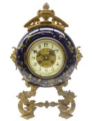 19th century French gilt metal mounted ceramic circular mantel clock,
