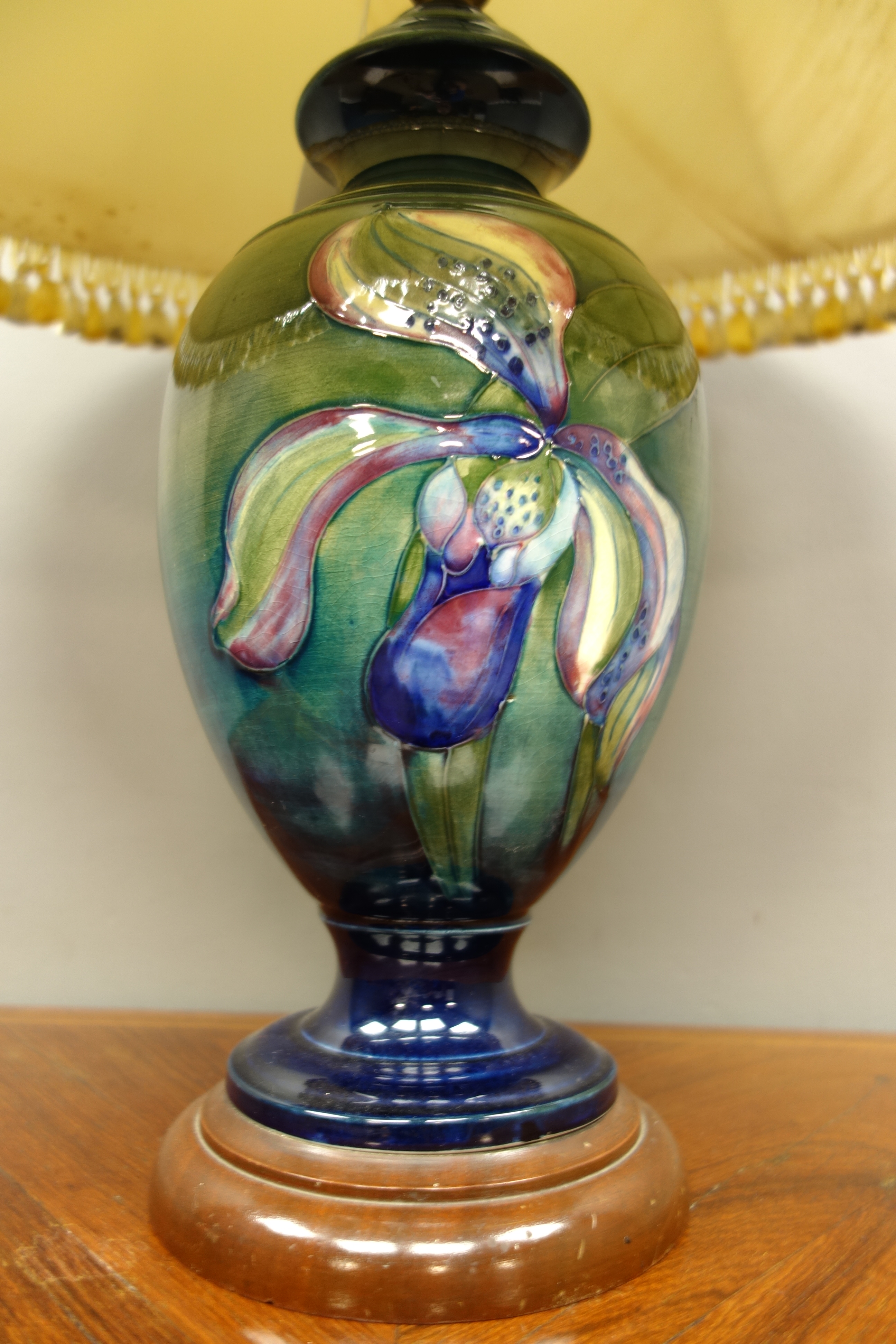 Moorcroft Orchid pattern classical shaped lamp vase on green ground and turned wood base, - Image 2 of 3