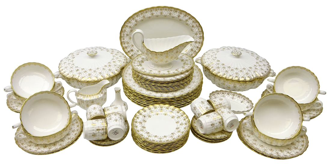 Spode 'Fleur De Lys' gold pattern dinner and part coffee service for eight persons
