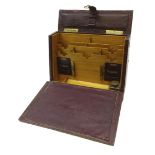 Victorian tooled leather correspondence box with fold down leather writing surface,