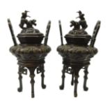 Pair 20th century Japanese bronze Koro and covers, relief decorated bulbous body,