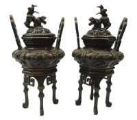 Pair 20th century Japanese bronze Koro and covers, relief decorated bulbous body,