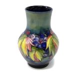 Moorcroft Grape and Leaf pattern vase of squat form, impressed signature and 'Potter to H.