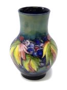 Moorcroft Grape and Leaf pattern vase of squat form, impressed signature and 'Potter to H.