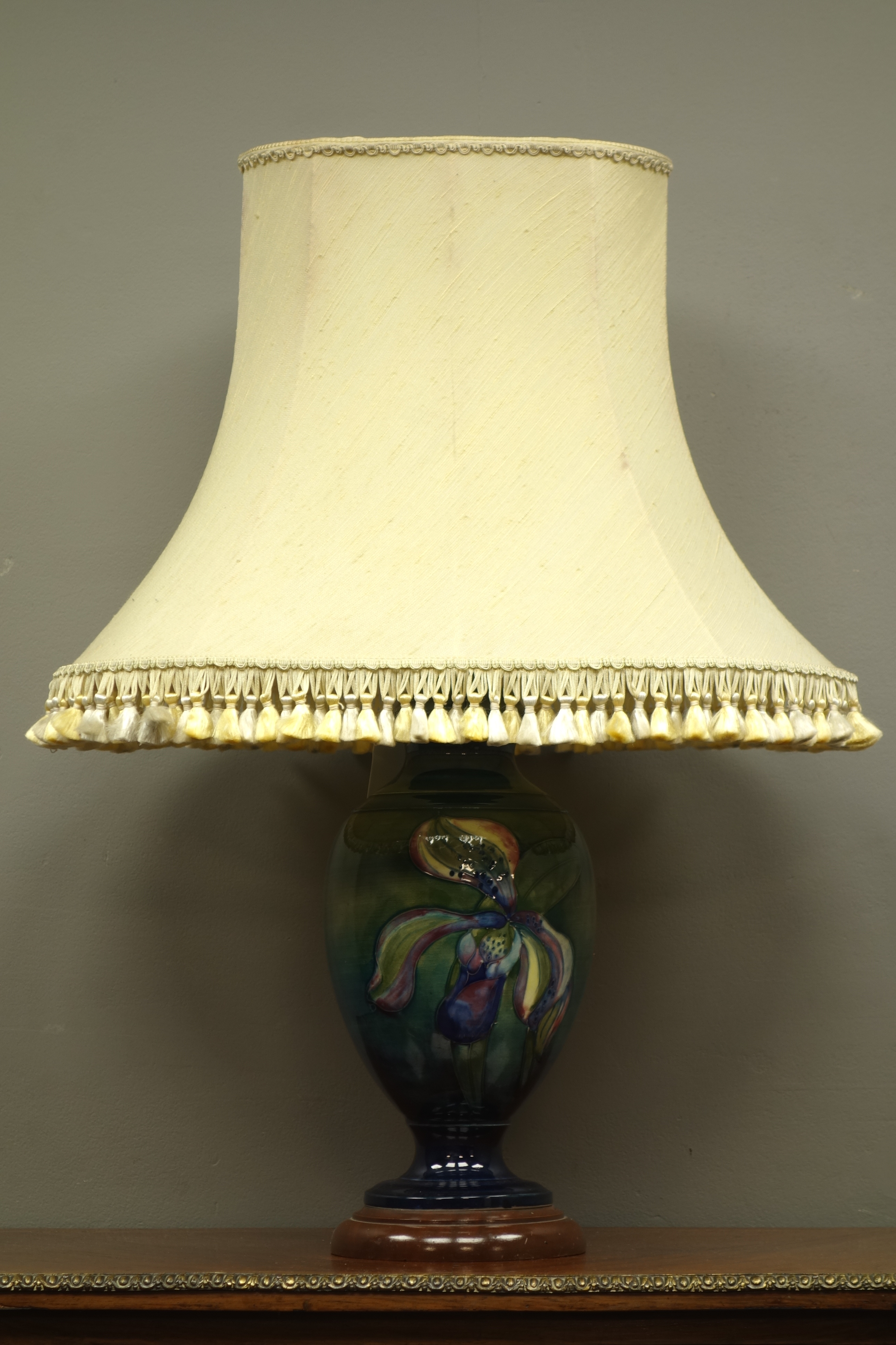 Moorcroft Orchid pattern classical shaped lamp vase on green ground and turned wood base, - Image 3 of 3