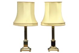 Pair gilt-brass corinthium column table lamps on stepped square bases with shades,