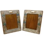 Pair of Art Nouveau silver and enamel on oak freestanding photograph frames by A & J Zimmerman Ltd