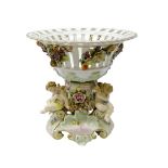 German Sitzendorf porcelain centrepiece, the pierced basket applied with fruit and trailing flowers,