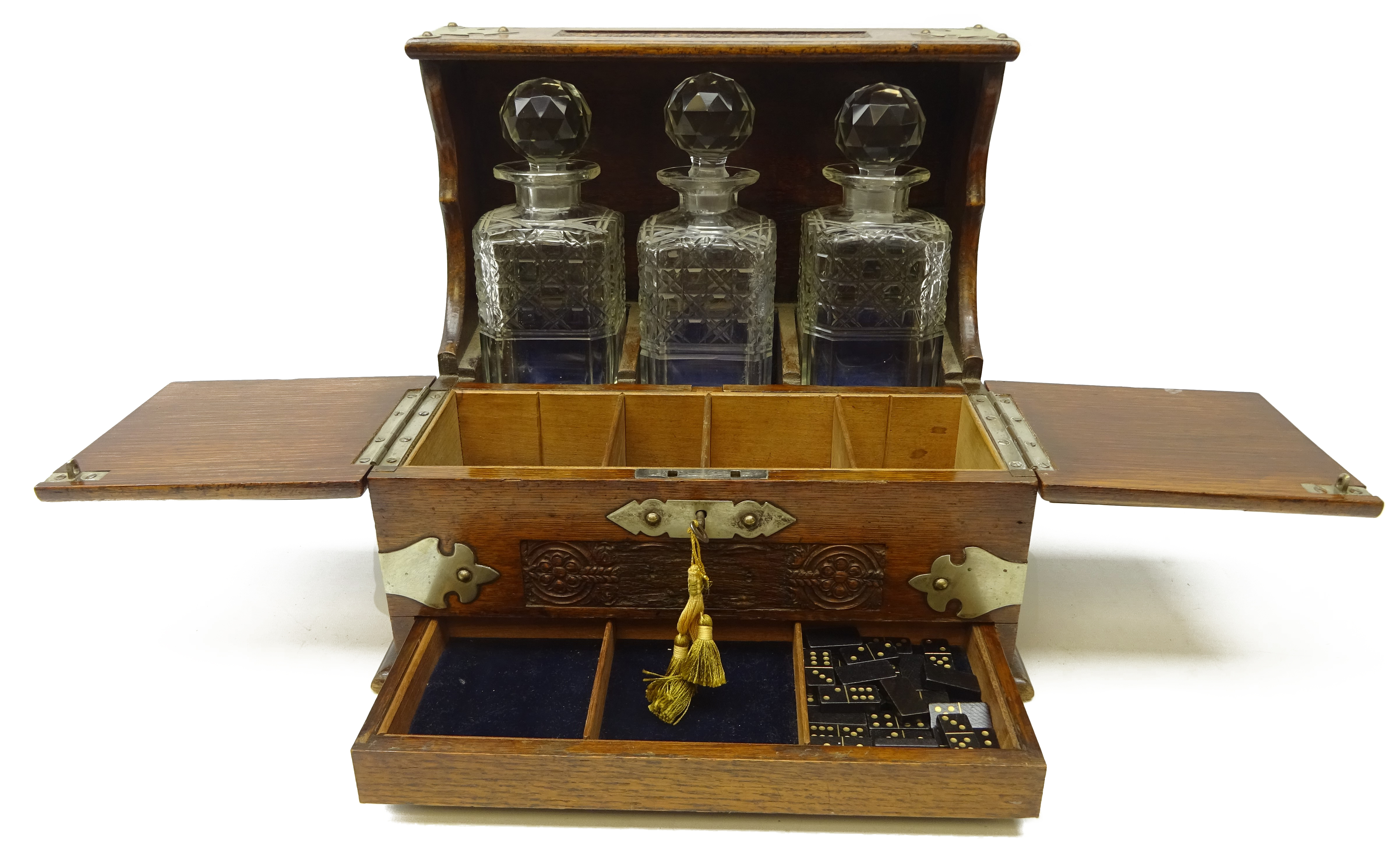 Edwardian oak three bottle tantalus with silver-plated mounts, carved floral panels, - Image 2 of 3