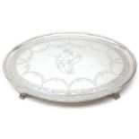 Oval silver tray with bright cut decoration and crest, maker's mark double stamped R.