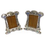 Pair of Art Nouveau silver and enamel on oak photograph frames by Walker & Hall 1906,