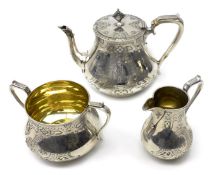 Victorian silver tea set with engraved decoration and gilt interior by Henry Holland, London 1870,