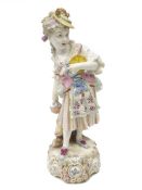 Mid 19th century Meissen figure of a woman clutching a basket, by a tree stump, on scrolled base,