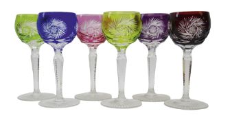 Set of six harlequin coloured overlay cut hock glasses, faceted stems and star cut base, H16.