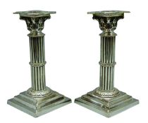 Pair late 19th century silver-plated Corinthian column shaped candlesticks on stepped bases,