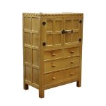 'Mouseman' panelled oak tallboy, cupboard above two short and two long drawers,