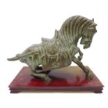 20th Century Chinese Tang Dynasty style bronze model of a Tang Horse, on hardwood base,